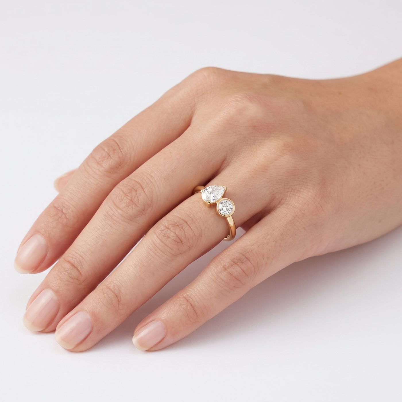 0.48ct Pear Shape Diamond and 0.22ct Round Diamond Toi et Moi
